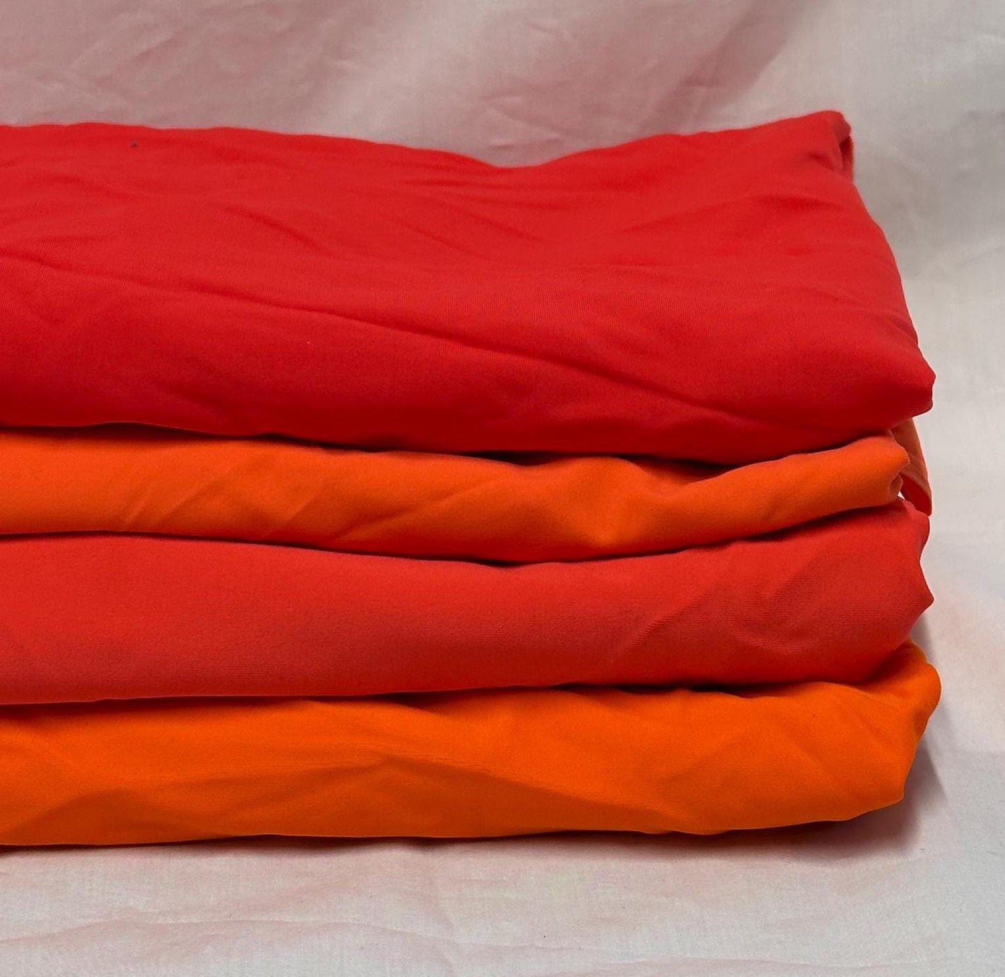 Nylon Spandex Tricot Solid Swimwear Activewear Fabric By The Yard Orange Coral Hues